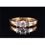 An 18ct yellow gold and diamond ring set with a round brilliant-cut diamond of approximately 0.30