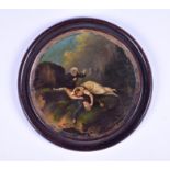 A 19th century German painted lacquered roundel the reverse inscribed 'Das grab auf dem oylin',
