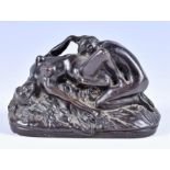 A 19th century French bronze erotic group of two lovers, her in the throes of passion, on a