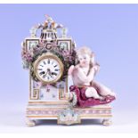 A 19th century Meissen porcelain cherub mantel clock formed as clock movement centred in a small