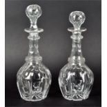 A graduated pair of Victorian cut glass decanters the tallest 28.5 cm. (2)