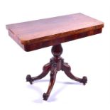 A Victorian rosewood veneered card table the figured top opening to reveal a red baize interior,