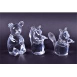 A Daum clear crystal bear and two Daum clear crystal squirrels 19 cm high maximum, each signed to