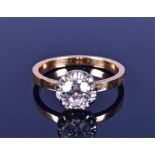 A solitaire diamond ring set with an old European-cut diamond of approximately 1.0 carats,
