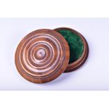 A 19th century turned treen felt lined patch box of circular form with ringed detail to cover, the
