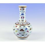 A Chinese famille rose vase baluster vase early 20th century, decorated with butterflies to the neck