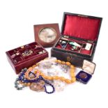 A quantity of costume jewellery to include two yellow metal rings with paste stones, two leather-