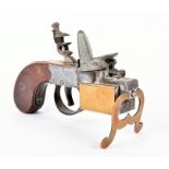 A Dunhill Tinder Pistol table lighter in the form of a flintlock pistol, marked 'Dunhill Tinder