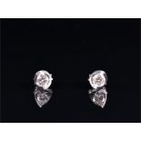 A pair of 18ct white gold and diamond ear studs the round brilliant-cut diamonds approximately 0.