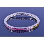 A multi-coloured sapphire bracelet set with approximately 8.00 carats of rainbow sapphires,