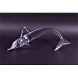 A Daum French clear crystal of a dolphin signed to side, 52 cm long. CONDITION REPORT No apparent