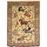 A 20th century Persian part silk carpet the central mushroom field depicting huntsmen pursing prey