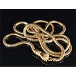 An unusual pinchbeck snake-link chain necklace with hand-shaped clasp, in the 19th century style.
