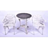 A pair of Coalbrookdale style cast aluminium chairs and a garden pub table with circular marble top,