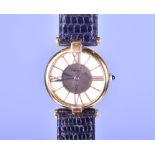 A Must de Cartier ladies silver gilt quartz wristwatch the pierced gilded dial with Roman