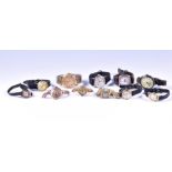 A group of assorted wristwatches including three 9ct gold watches a Movado Sport watch and others.