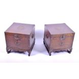 A pair of Chinese hardwood boxes with brass mounts of Chinese characters, the interiors lined with