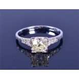 An 18ct white gold and diamond ring set with an old-cut diamond of approximately 1.20 carats, set