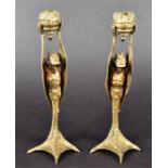 A pair of late 19th century brass candlesticks in the grotesque manner modelled as 'devil'