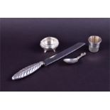 A Continental silver-handled bread knife marked '925', together with a white metal tot cup in the