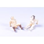 A late 19th / early 20th century Japanese carved ivory erotic lovers carved as two joining (