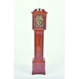 A small Georgian mahogany cased grandmother clock the brass dial with black Roman numerals with