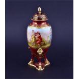 A 20th century Vienna style porcelain potpourri vase and cover titled 'Rinaldo & Almida' the central