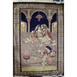 A 20th century Persian silk carpet depicting a palace scene with figures to the central field