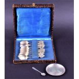 A boxed set of 12 Russian silver coffee spoons with pierced decoration, marked .830, together with a