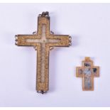 A Russian gilt metal and glass mounted coptic cross pendant designed with fine beeded wire work,