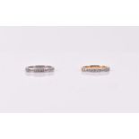 An 18ct white gold and diamond half-eternity ring together with a yellow metal and diamond half-