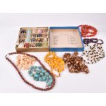 A collection of twenty mineral examples  in the form of eggs, including amethyst, carnelian, jasper,