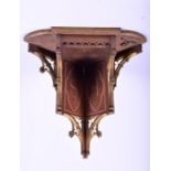 An early 20th century oak and gilt painted church vestry corner sconce featuring the initials 'S A',