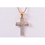Theo Fennell. An 18ct yellow gold and diamond cross pendant pave-set with round-cut diamonds, with