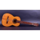 A mid-20th century Spanish acoustic guitar bearing an interior label for Rodolfo Prados, Malaga,