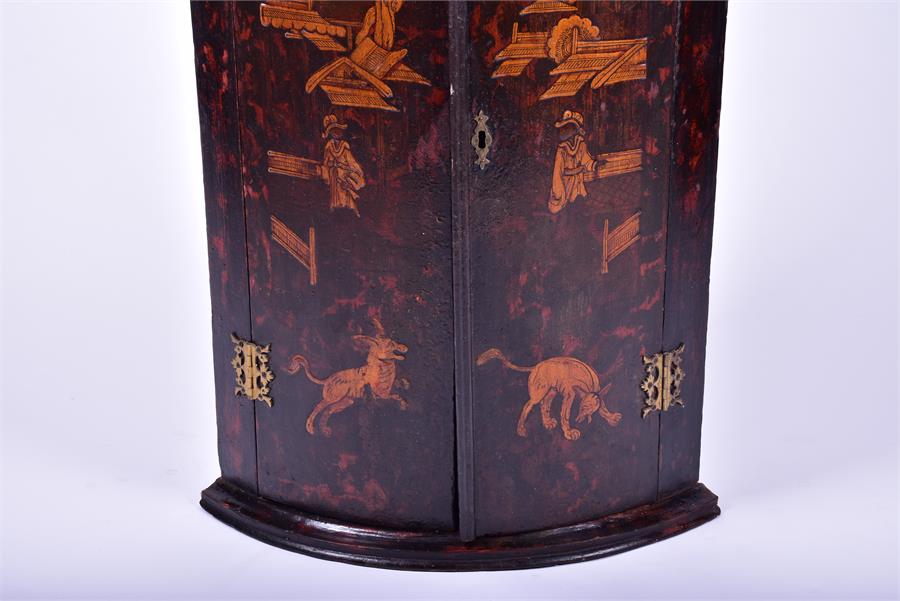 An 18th century painted pine chinoiserie corner cabinet of bow fronted form, the doors painted - Image 4 of 7