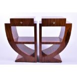 A pair of French Art Deco walnut veneered bedside tables complimentary of each other with