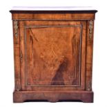 A Victorian figured walnut pier cabinet the figured top with moulded rim over a single door with