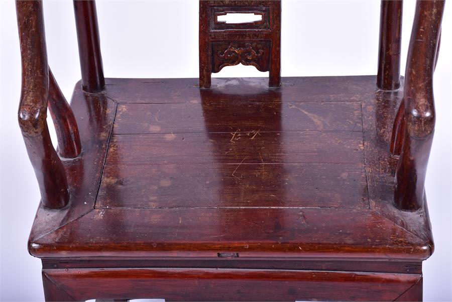 A Chinese hardwood horse shoe back armchair the central back splat carved with a mother and child - Image 6 of 6