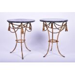 A pair of French marble top gilt side tables the circular veined marble top mounted below with