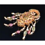 An unusual Eastern yellow metal, pearl, and gemstone brooch in the form of a beetle, the body set