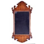 A Georgian mahogany framed pier glass wall mirror with cut scrolling frame, 88 x 44 cm (maximum).