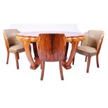 An Art Deco walnut veneered dining room suite attributed to Epstein comprising a burr walnut