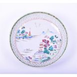 An 18th century Chinese Famille Rose porcelain plate the pierced rim plate decorated with polychrome