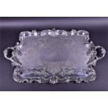 A large silver plated Regency style double handled tray with scrolled acanthus chased border and