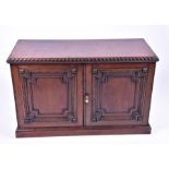 A Regency mahogany two-door proving cabinet the beaded and foliate panelled side and front opening