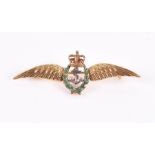 RAF interest. A 9ct yellow gold RAF logo brooch with green enamel wreath and crown, 4.2 cm wide, 3.5