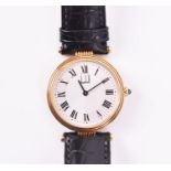 A Dunhill 18ct yellow gold quartz dress wristwatch the engine turned silvered dial with black