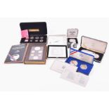 MIXED COINS, WORLD. Presentation sets and other coins Including the USA Olympic Collection, 1983,