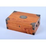 An Indian satinwood jewellery box of rectangular form, the removable upper tray with three hinged-